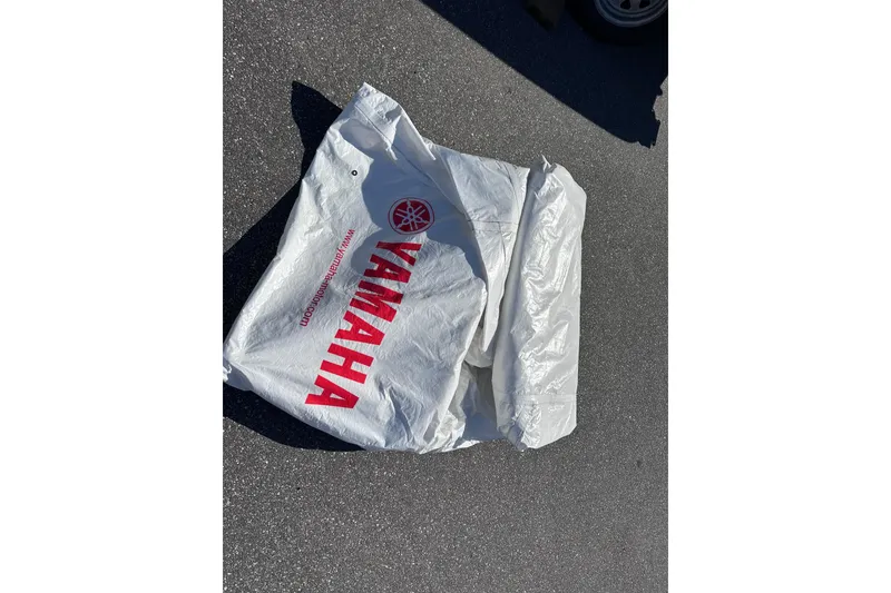 Slide: The Image of Protective cover for 2021 Yamaha Boats 252S on asphalt surface. - 47