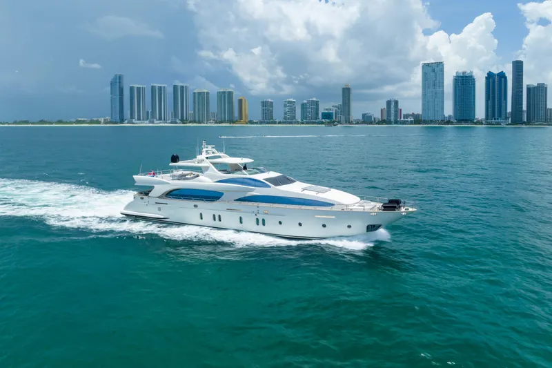 Slide: The Image of Luxury 2012 Azimut yacht cruising near city skyline on a sunny day. - 2