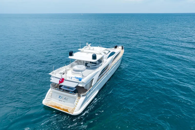 Slide: The Image of Luxurious 2012 Azimut yacht cruising on open sea, rear view. - 23