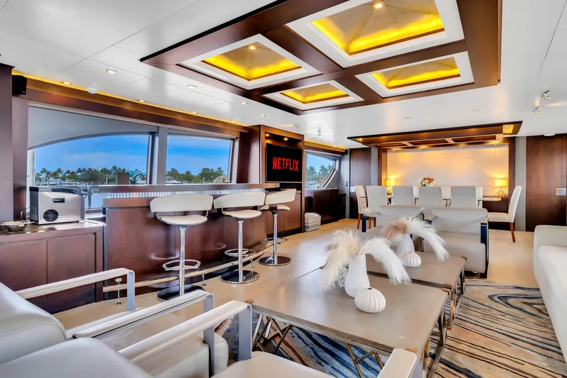 Slide: The Image of Luxurious 2012 Azimut yacht interior with modern bar, seating, and elegant decor. - 27