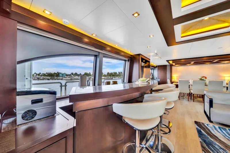 Slide: The Image of Luxurious 2012 Azimut yacht interior with modern bar, elegant seating, and scenic ocean view. - 30