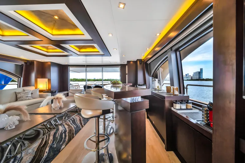 Slide: The Image of Luxurious 2012 Azimut yacht interior with modern design, elegant seating, and scenic water views. - 35