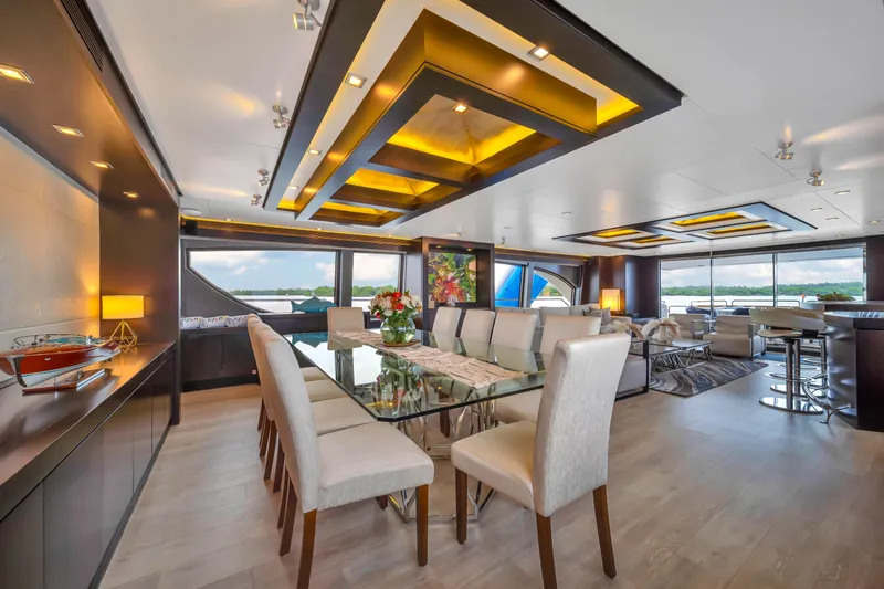 Slide: The Image of Luxurious 2012 Azimut yacht interior with elegant dining area and panoramic windows. - 36