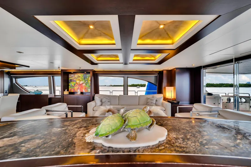 Slide: The Image of Luxurious 2012 Azimut yacht interior with elegant decor and turtle sculpture centerpiece. - 40
