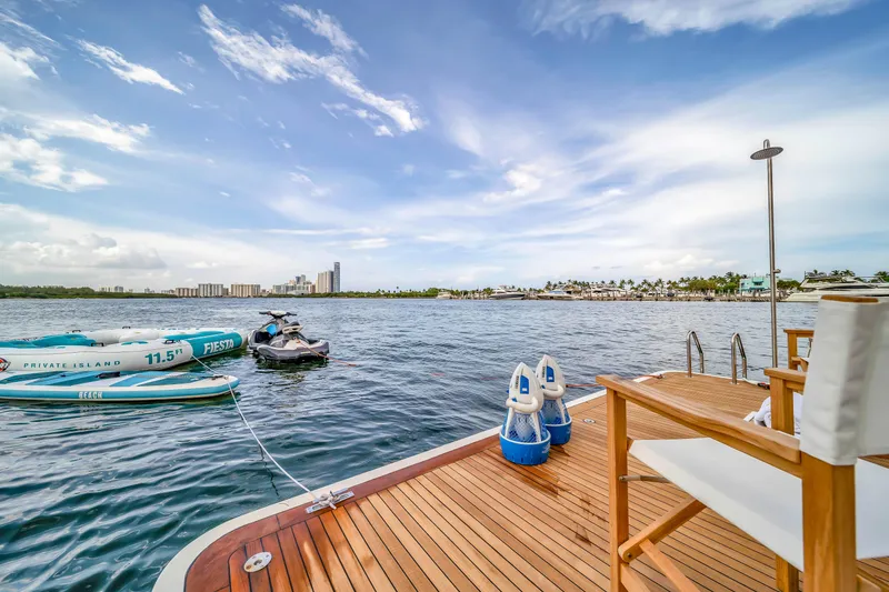 Slide: The Image of Luxury yacht deck with ocean view, inflatable raft, and jet ski, Azimut 2012. - 50