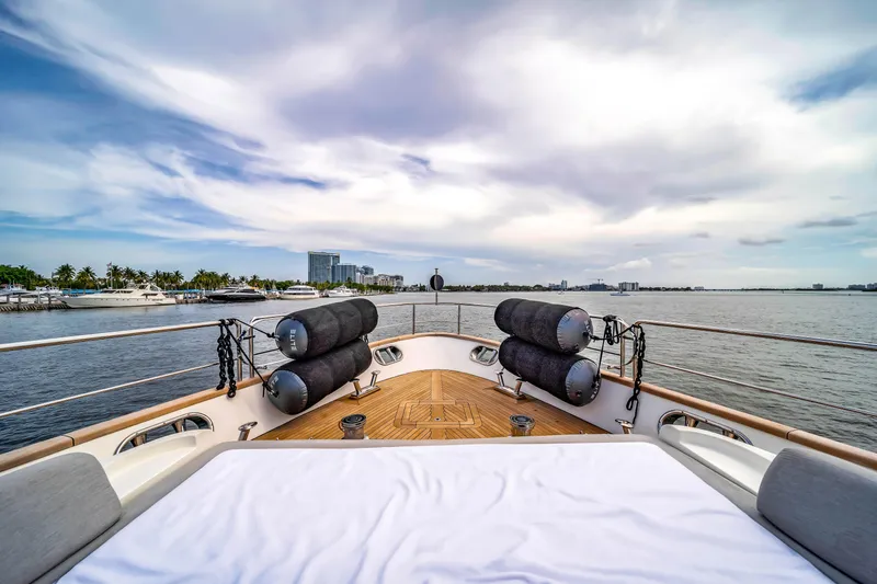 Slide: The Image of Luxurious 2012 Azimut yacht deck with scenic waterfront view and city skyline. - 53