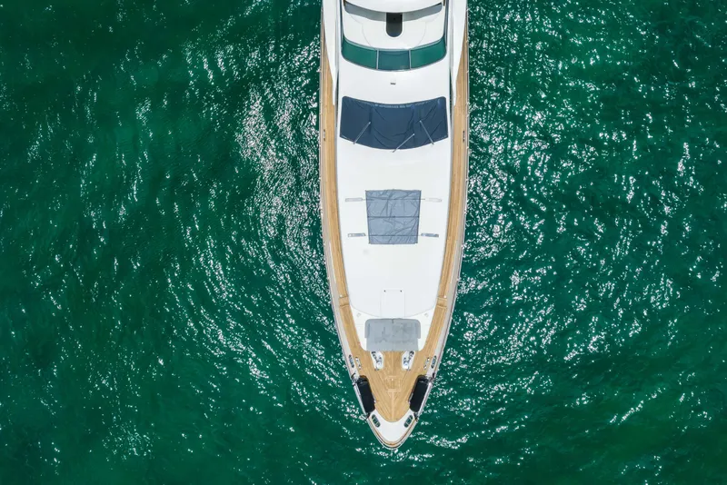 Slide: The Image of Aerial view of 2012 Azimut yacht on sparkling turquoise water. - 8