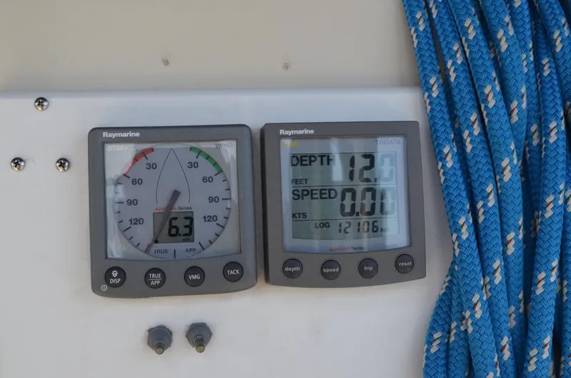 Slide: The Image of Digital marine instruments on a 1980 Cooper 416 Pilothouse boat dashboard. - 19