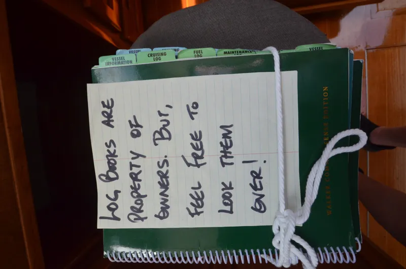 Slide: The Image of Log books with note on Cooper 416 Pilothouse, 1980, inviting review. - 43