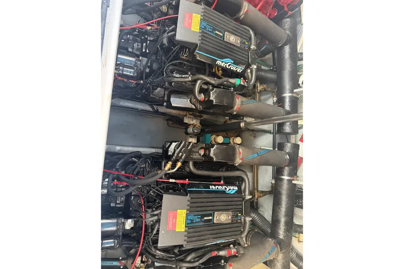 Slide: The Image of Engine compartment of a 1996 Sea Ray Sundancer 330 with MerCruiser engines. - 5