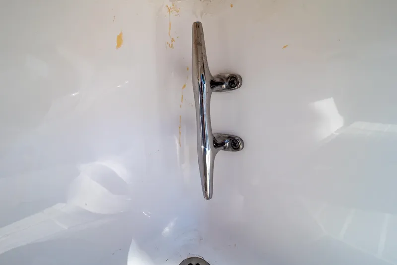 Slide: The Image of Chrome cleat on 2016 Intrepid 400 Cuddy boat, mounted on white surface. - 126