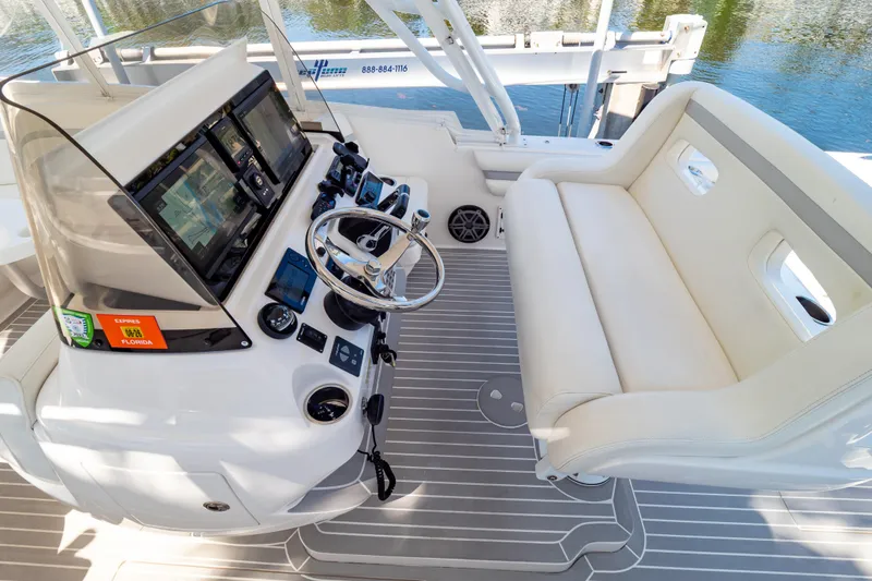 Slide: The Image of 2016 Intrepid 400 Cuddy helm with modern controls and comfortable seating. - 2