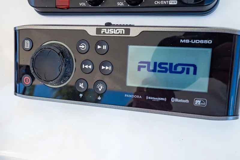 Slide: The Image of Fusion MS-UD650 audio system on 2016 Intrepid 400 Cuddy boat dashboard. - 22