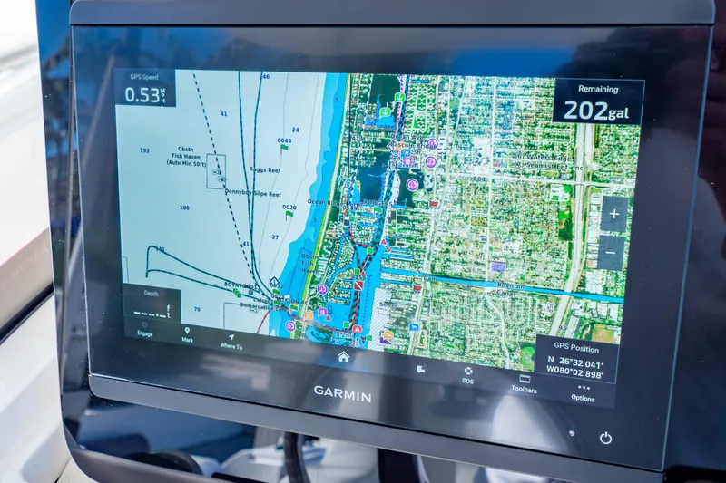 Slide: The Image of Garmin GPS display on 2016 Intrepid 400 Cuddy, showing navigation map and fuel level. - 23