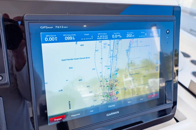 Slide: The Image of Garmin GPS display on 2016 Intrepid 400 Cuddy, showing East Florida Coast navigation map. - 24