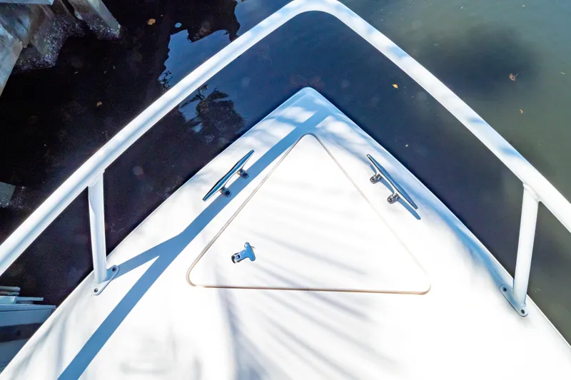 Slide: The Image of Bow view of 2016 Intrepid 400 Cuddy boat, featuring sleek design and sturdy railings. - 32
