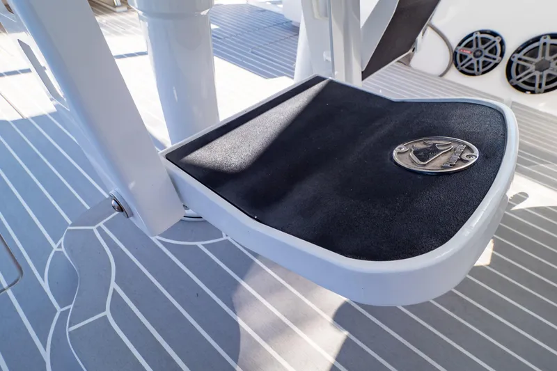 Slide: The Image of Intrepid 400 Cuddy 2016 boat deck detail with non-slip surface and metal fixture. - 51