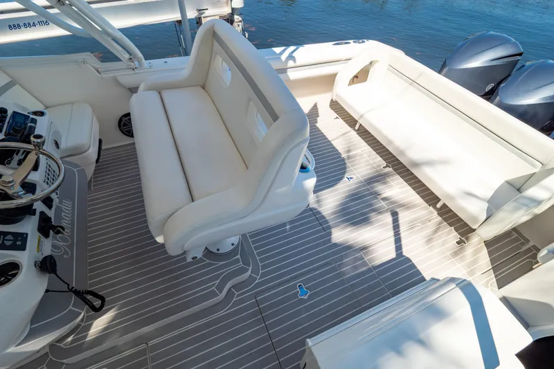 Slide: The Image of Luxurious 2016 Intrepid 400 Cuddy boat interior with plush seating and sleek design. - 59