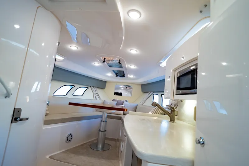 Slide: The Image of Luxurious interior of 2016 Intrepid 400 Cuddy boat with modern amenities and elegant design. - 61