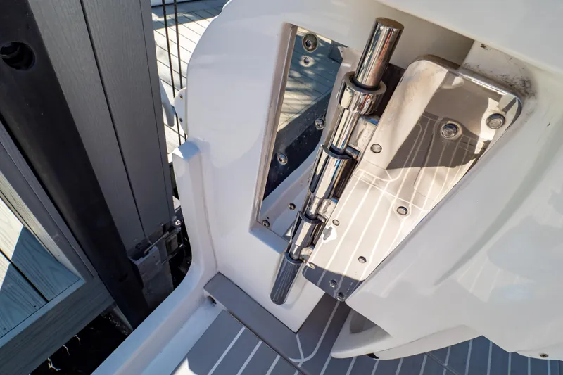 Slide: The Image of Stainless steel hinge detail on 2016 Intrepid 400 Cuddy boat. - 62