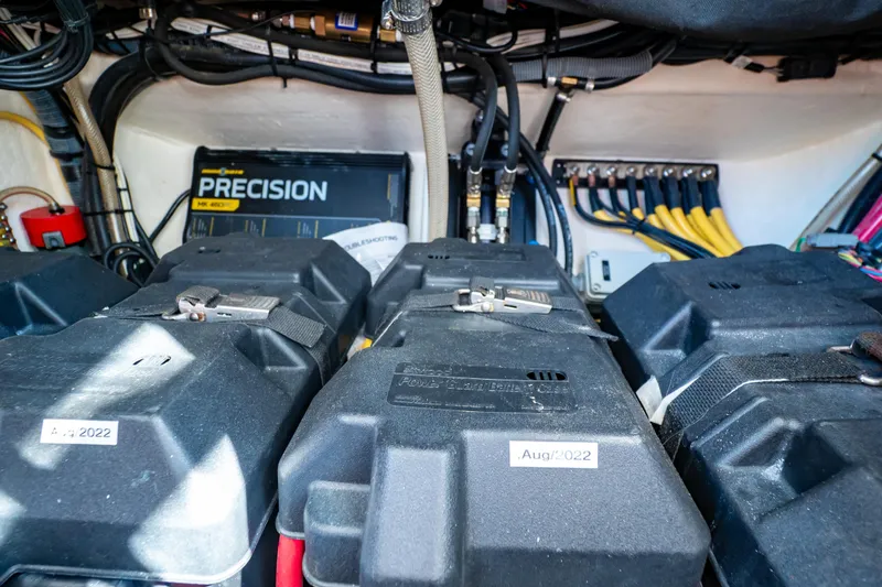 Slide: The Image of Electrical system of a 2016 Intrepid 400 Cuddy boat, featuring batteries and wiring. - 75