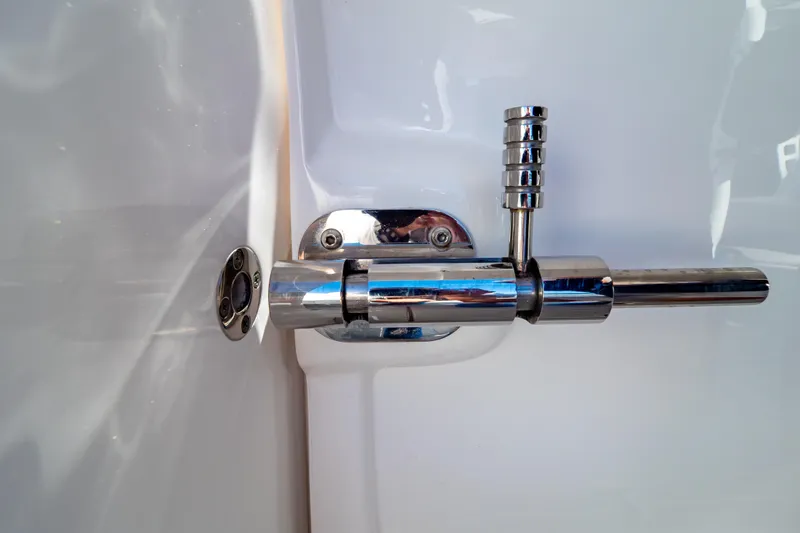 Slide: The Image of Chrome latch detail on a 2016 Intrepid 400 Cuddy boat. - 76