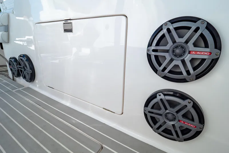 Slide: The Image of Speakers on a 2016 Intrepid 400 Cuddy boat, featuring JL Audio equipment. - 81