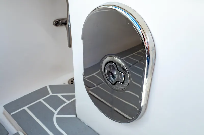 Slide: The Image of Chrome detail on 2016 Intrepid 400 Cuddy boat, featuring sleek design and modern finish. - 82