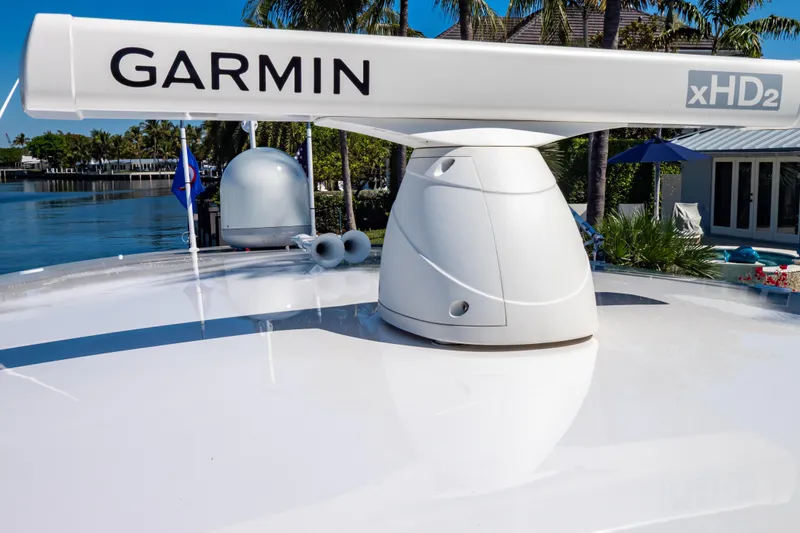 Slide: The Image of Garmin xHD2 radar on 2016 Intrepid 400 Cuddy boat, docked near waterfront property. - 90