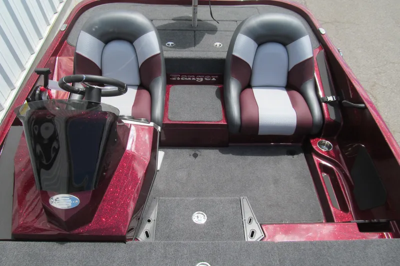 Slide: The Image of 2026 Ranger Z185 boat interior with dual seats and steering console. - 10