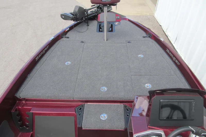 Slide: The Image of 2026 Ranger Z185 boat deck with carpeted surface and mounted equipment. - 6