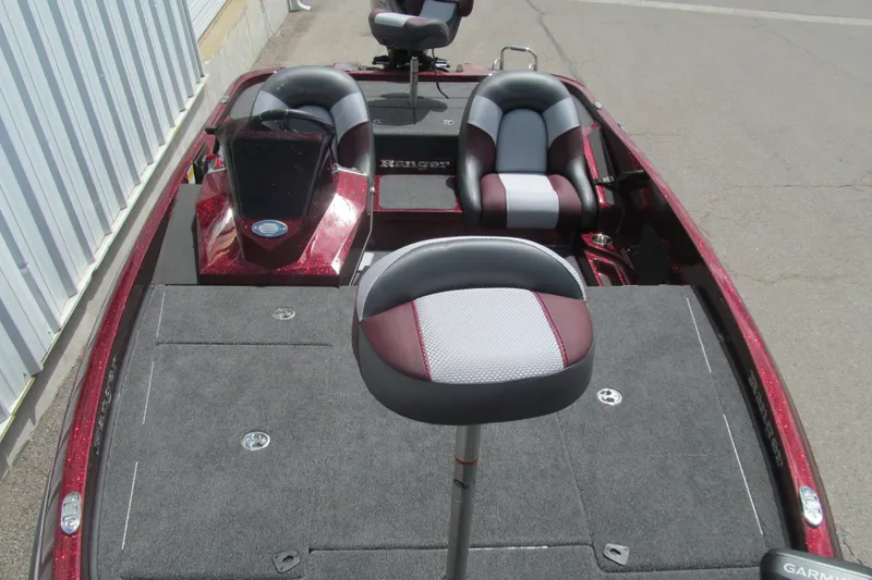 Slide: The Image of 2026 Ranger Z185 boat interior with dual seats and Garmin equipment. - 9