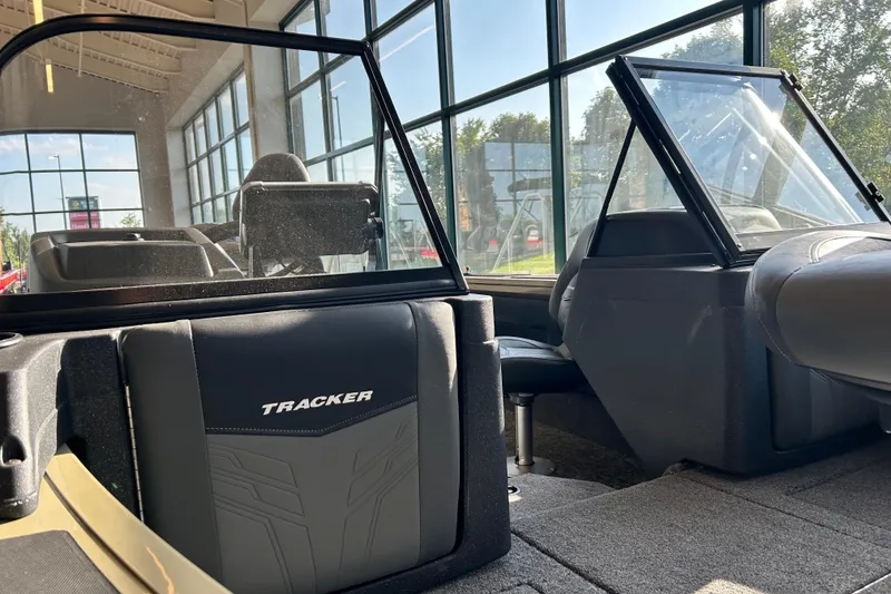 Slide: The Image of Interior view of 2026 Tracker Targa V-19 WT boat with seating and windshield. - 3