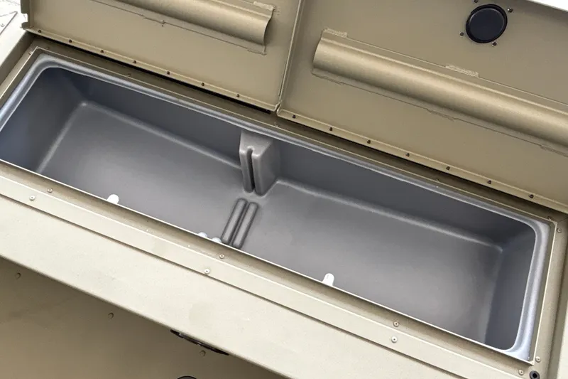 Slide: The Image of Open storage compartment in 2026 Tracker Grizzly 2072 CC boat. - 33