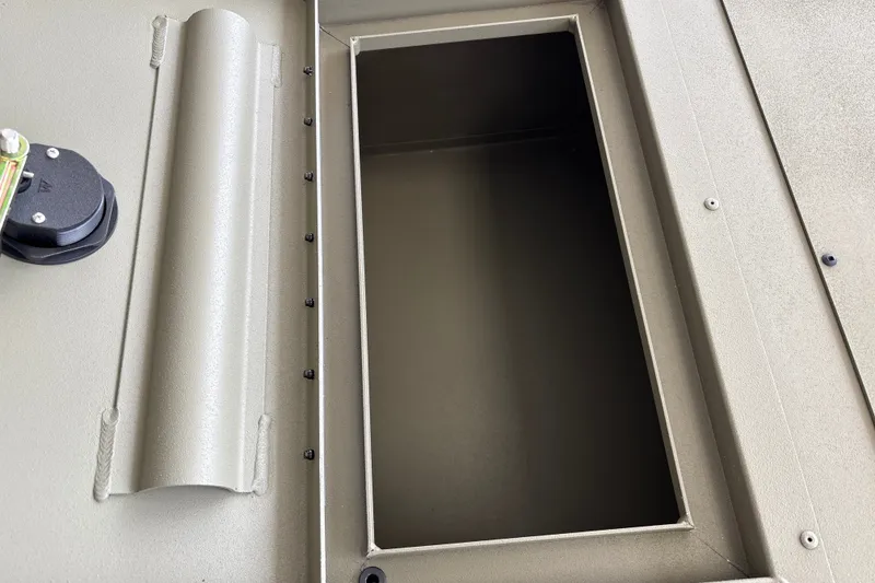 Slide: The Image of Storage compartment of 2026 Tracker Grizzly 2072 CC boat, featuring durable construction. - 36