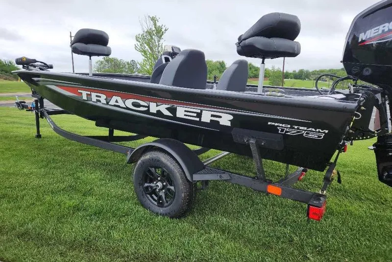 Slide: The Image of 2026 Tracker Pro Team 175 boat on trailer, displayed on grass. - 61