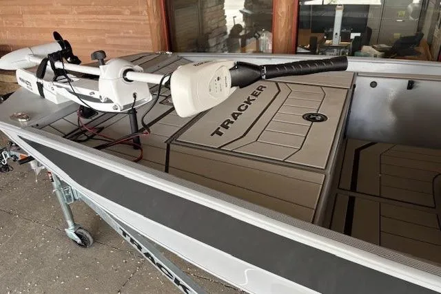 Slide: The Image of 2026 Tracker Bass Tracker Classic CC boat with mounted trolling motor. - 2