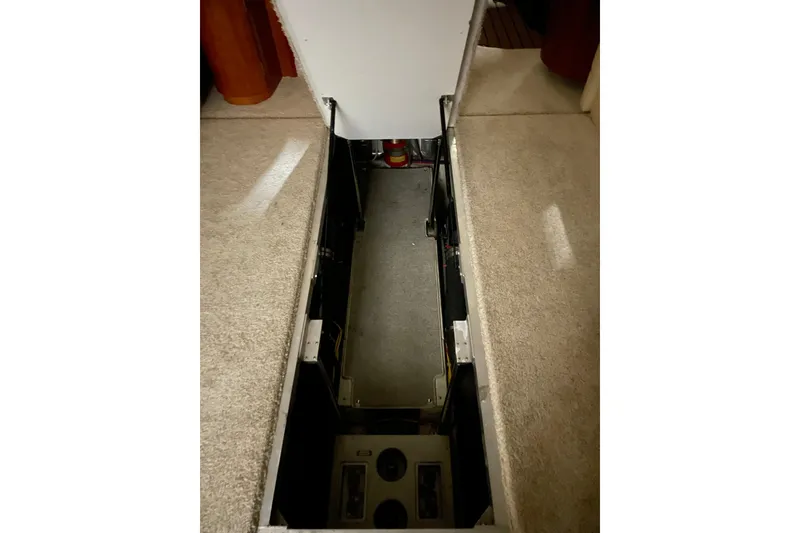 Slide: The Image of Open engine compartment of 2004 Carver 420 Mariner yacht, showcasing interior details. - 16