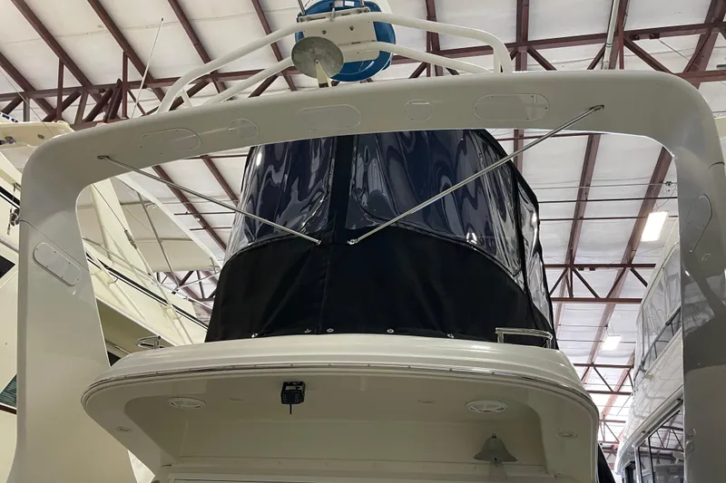 Slide: The Image of 2004 Carver 420 Mariner yacht in a boat storage facility. - 21