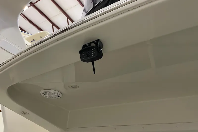 Slide: The Image of 2004 Carver 420 Mariner boat with mounted security camera and speaker system. - 28