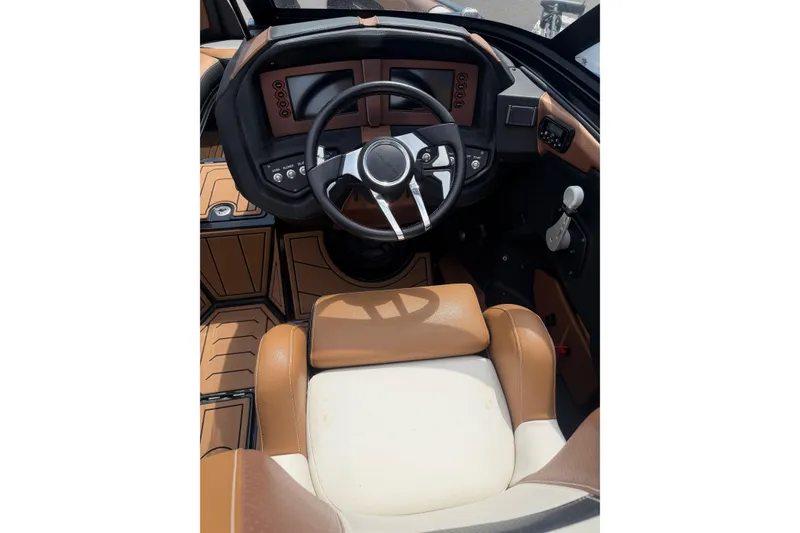 Slide: The Image of 2020 Centurion Ri237 boat interior with steering wheel and dashboard controls. - 12