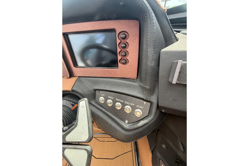 Slide: The Image of 2020 Centurion Ri237 dashboard with control panel and display screen. - 14