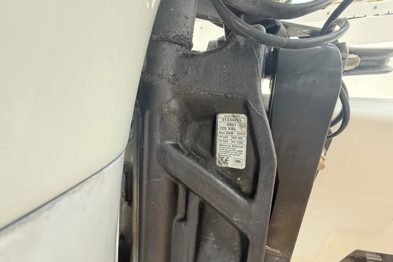 Slide: The Image of Close-up of a 2001 Wellcraft 29 Scarab Sport Open engine serial number plate. - 36