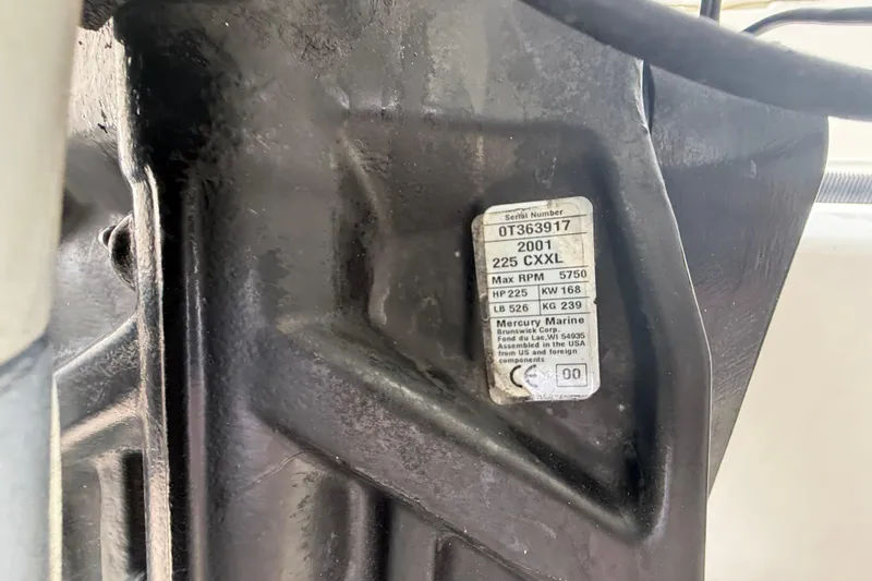 Slide: The Image of Label on 2001 Wellcraft 29 Scarab Sport Open, displaying serial and engine specifications. - 37