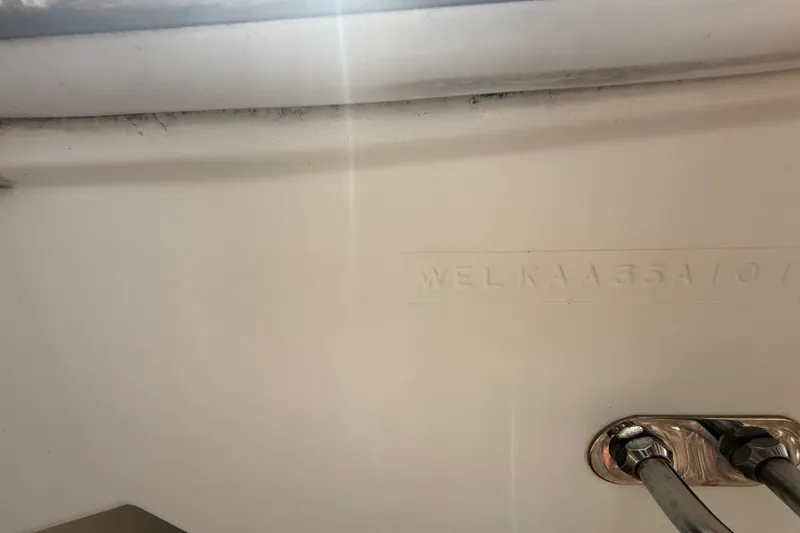 Slide: The Image of Close-up of 2001 Wellcraft 29 Scarab Sport Open hull identification number. - 47