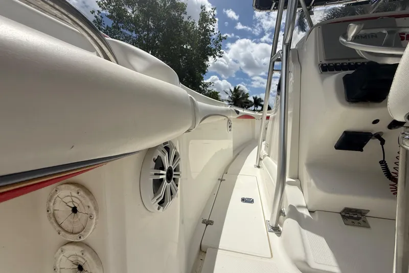 Slide: The Image of 2001 Wellcraft 29 Scarab Sport Open boat interior with speakers and control panel. - 82