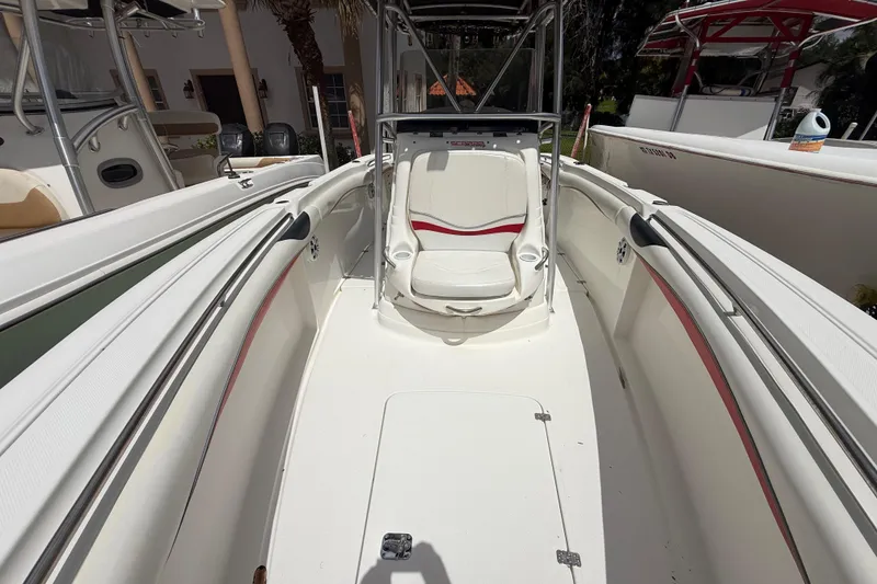 Slide: The Image of 2001 Wellcraft 29 Scarab Sport Open boat interior with white and red seating. - 98