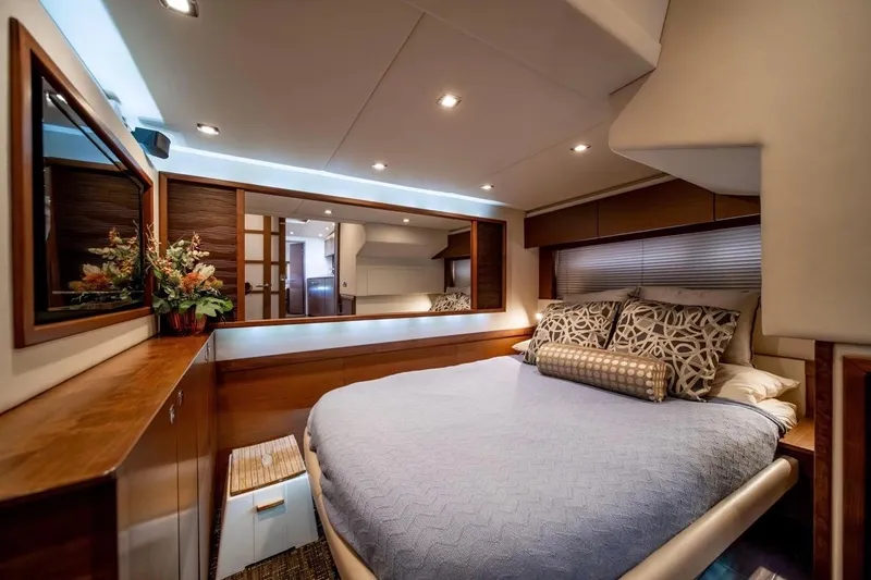 Slide: The Image of Luxurious 2013 Sea Ray Sundancer 540 yacht bedroom with elegant decor and cozy bedding. - 14
