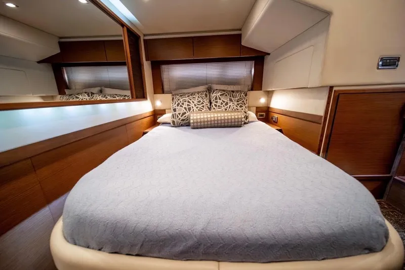 Slide: The Image of Luxurious bedroom interior of 2013 Sea Ray Sundancer 540 yacht with elegant bedding. - 15
