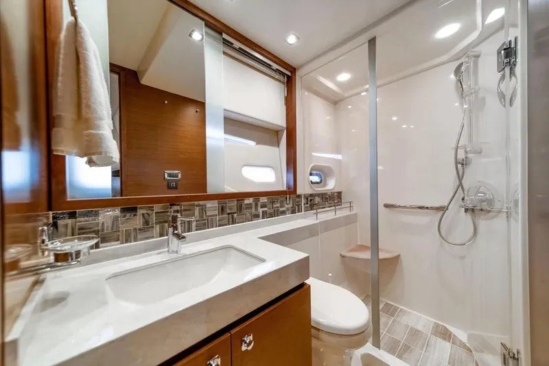 Slide: The Image of Luxurious bathroom in 2013 Sea Ray Sundancer 540 yacht with modern fixtures and elegant design. - 18
